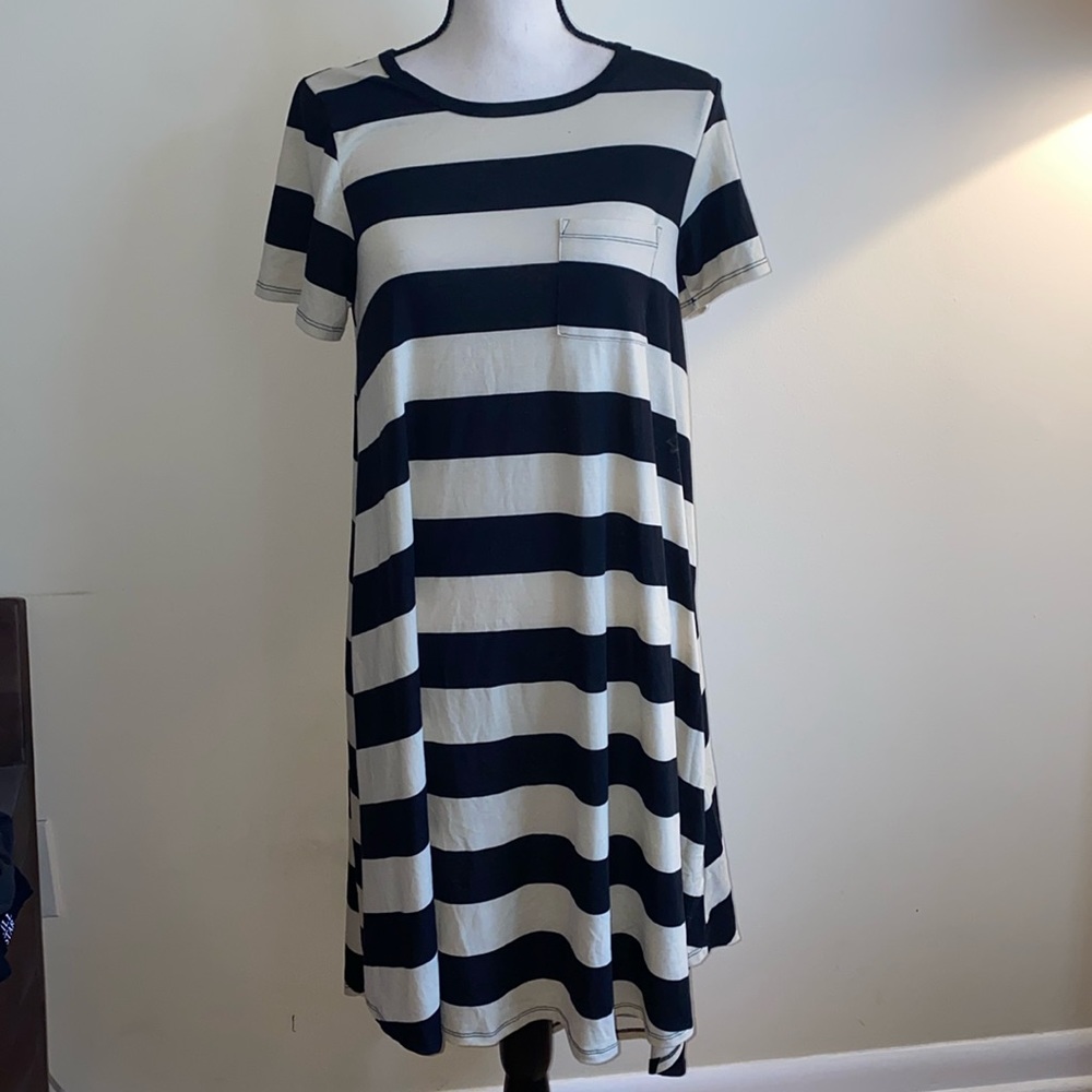 Lularoe Carly dress pugsley Addams Beetlejuice vibes 
Size small
Black and ivory